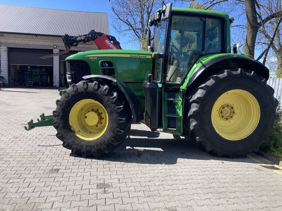 John  Deere. 7530 premium JD 7430