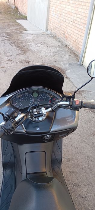 Продам максі скутер honda forza .