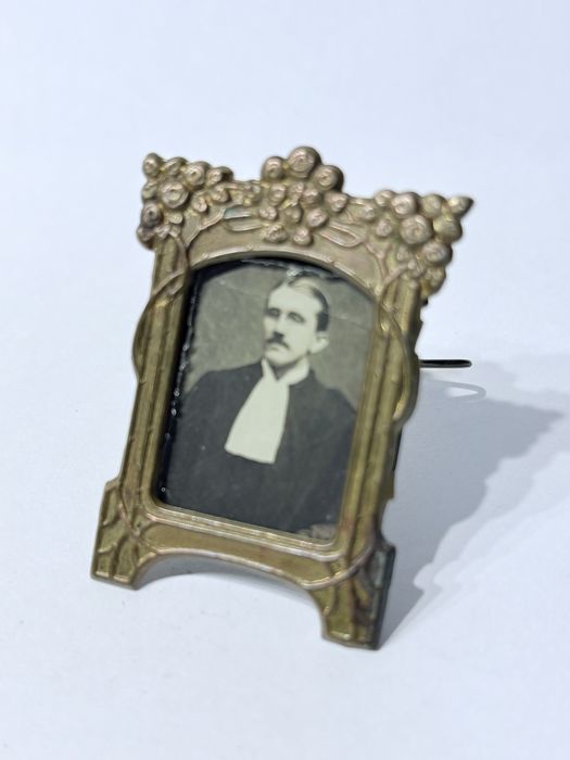 Vintage Art Nouveau miniature frame with a photograph of a priest