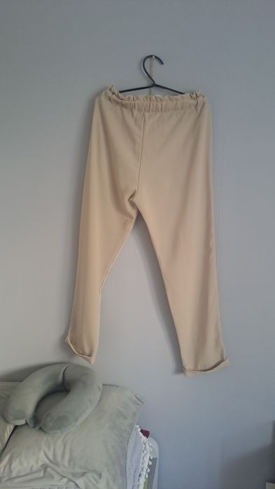 Spodnie eleganckie beżowe L/ XL