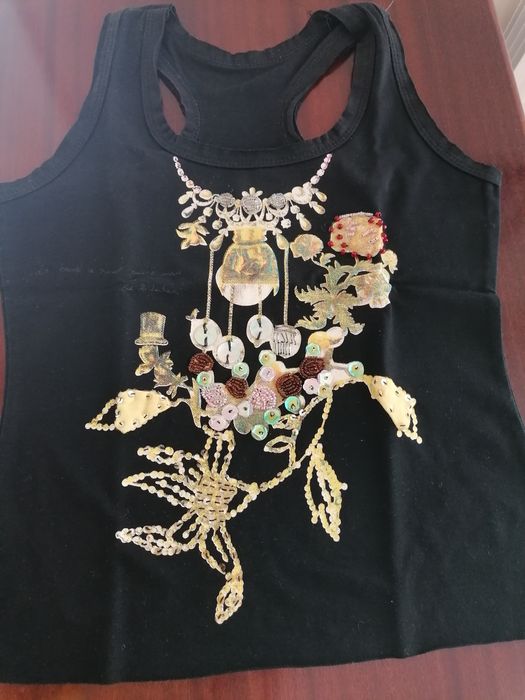 Camisolas, giras T.  M, desde