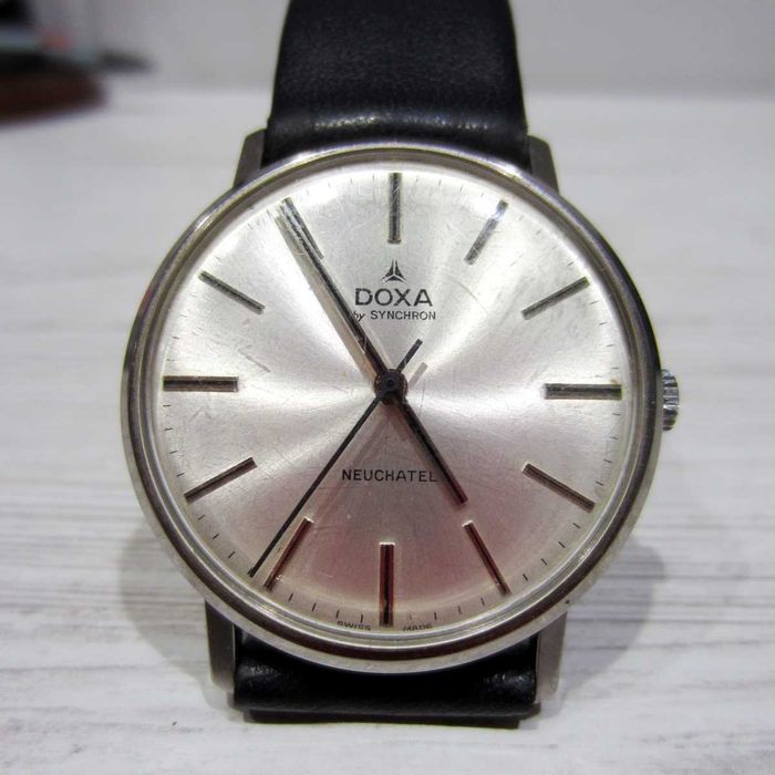 Doxa від synchron neuchatel