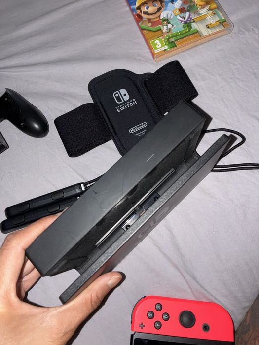 Nitendo switch ( completo vai com jogo do super mario maker 2)