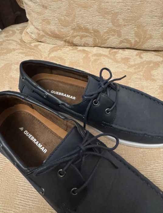 Sapatos de vela da quebramar