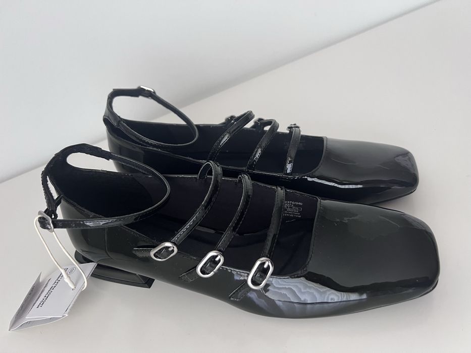 Sabrinas tiras fivelas