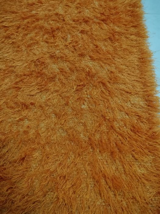 Tapetes com pelo alto