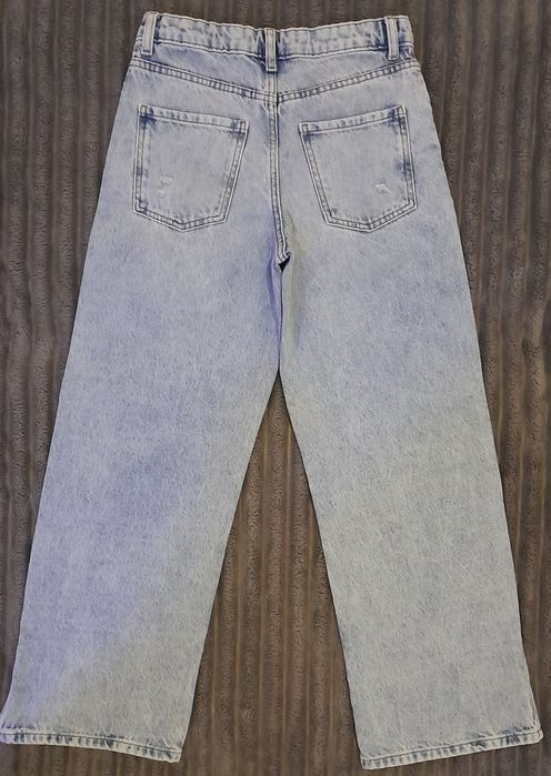 Джинсы палаццо с разрезами