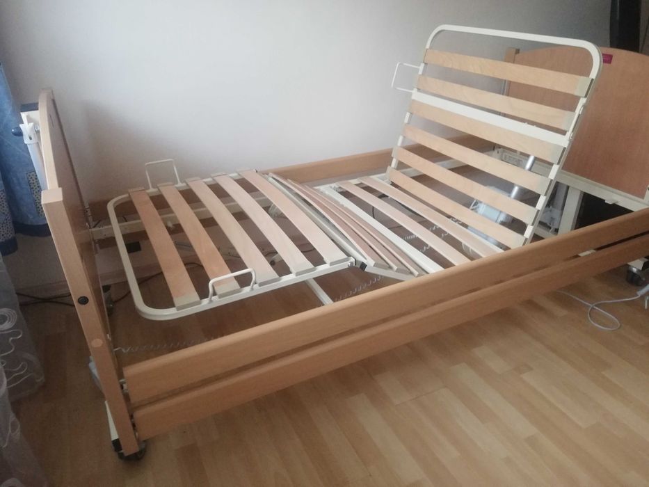 Łóżko rehabilitacyjne TAURUS sterowane elektrycznie, leże drewniane