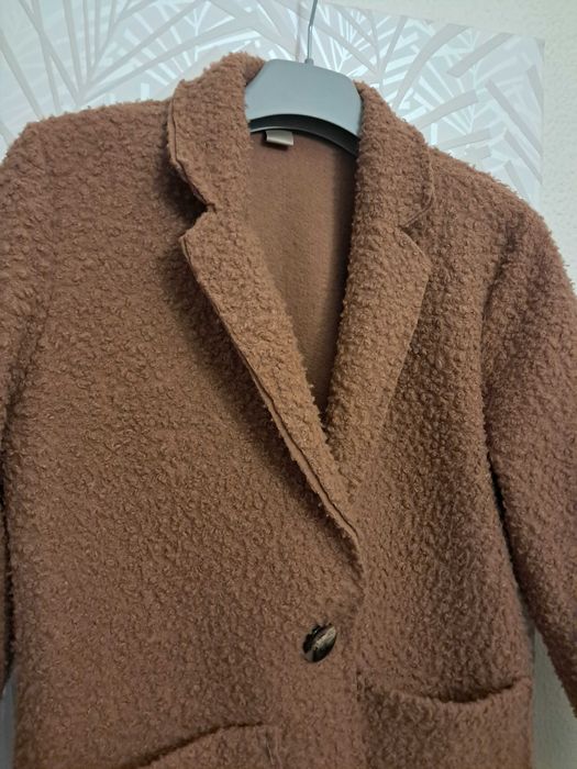 Casaco comprido de senhora