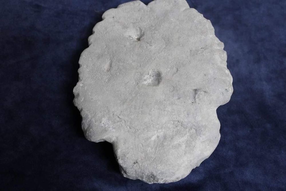 Cabeça em pedra, antiga.