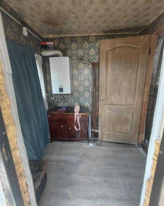 У продажу цегляний будинок
