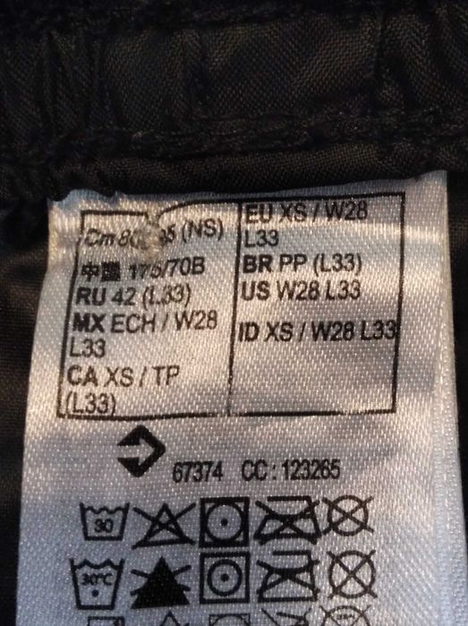 Spodnie przeciwdeszczowe Quechua roz. XS W28 L33