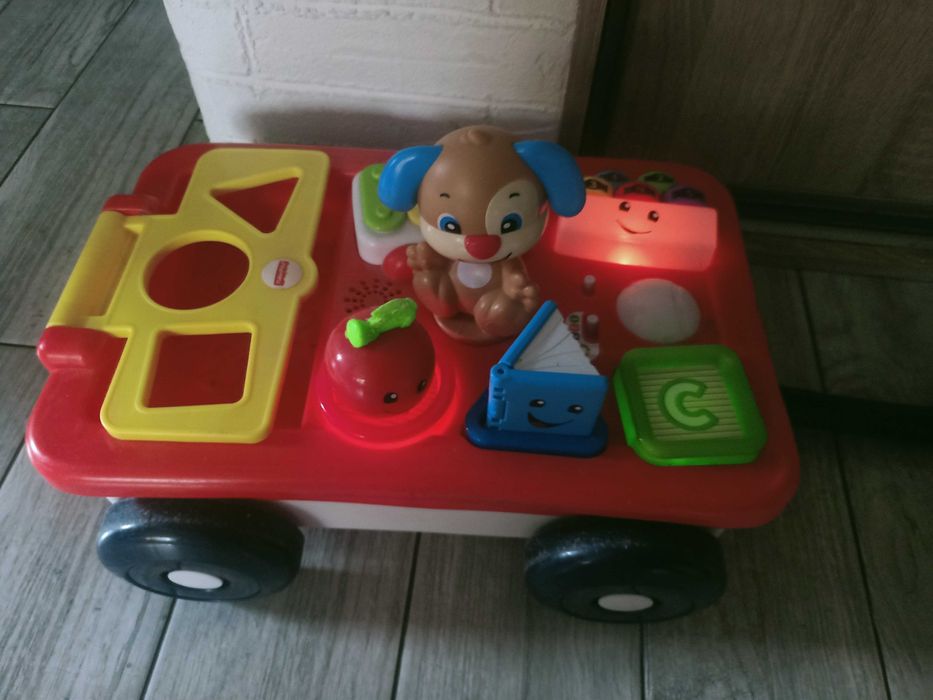 Fisher-Price edukacyjny wózek Szczeniaczek