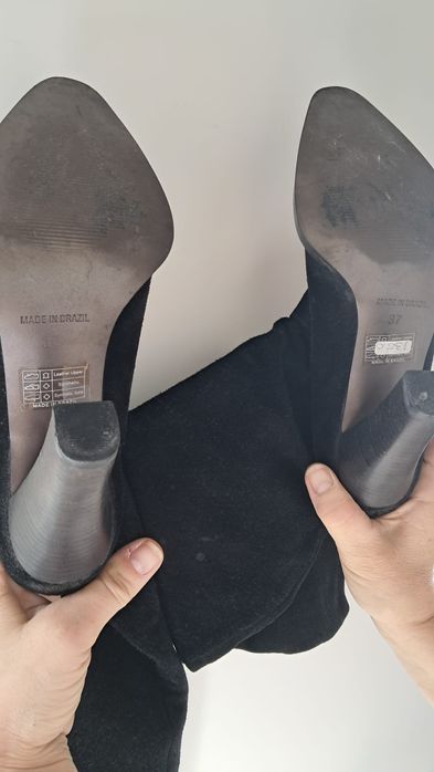 Botas de tacão e cano alto