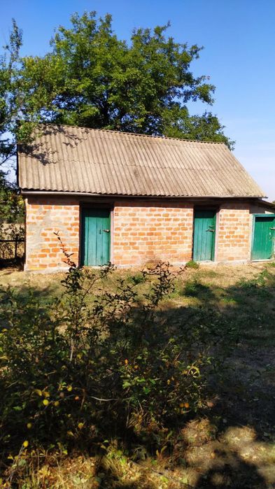 Продається цегляний будинок в селі Санжариха.