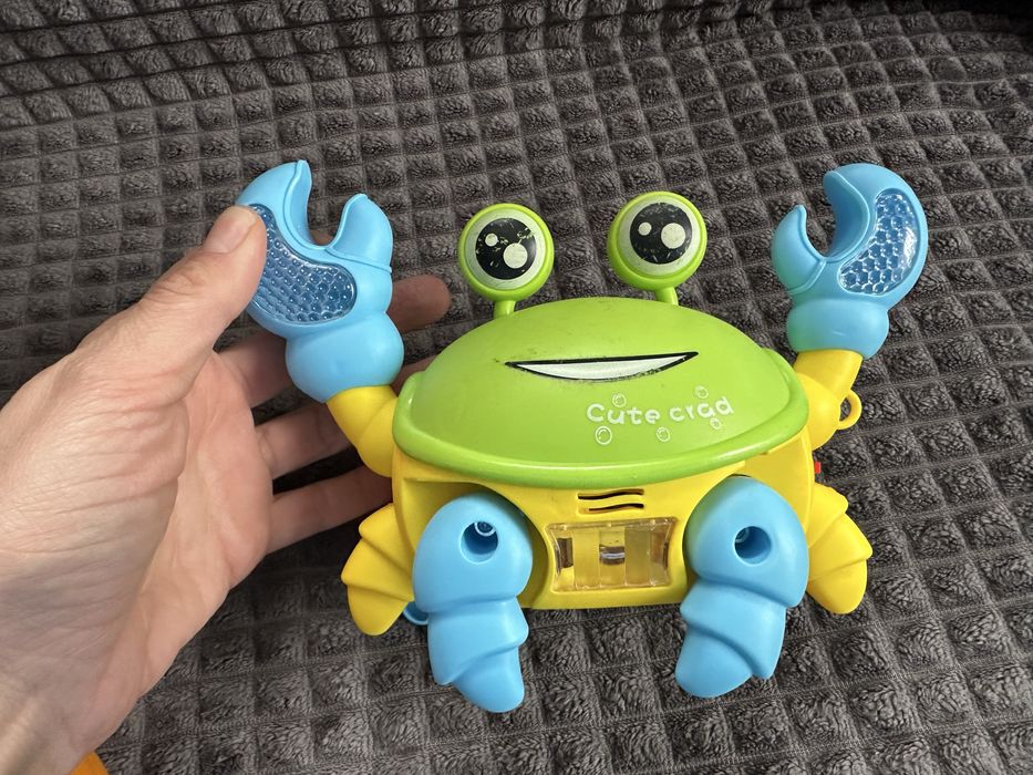 Музичний руль на коляску, танцюючий крабік, іграшки