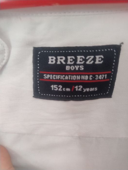 Продам білу сорочку на хлопчика
