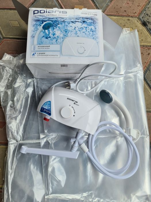 Водонагреватель проточный.