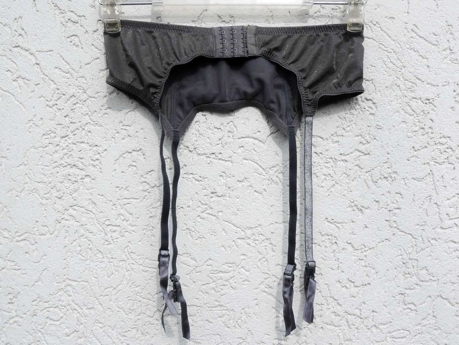 *Hennes & Mauritz* błyszczący srebrem roz 42-48