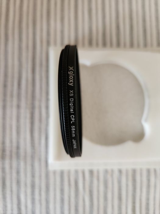 Filtro polarizador para objetivas de máquinas fotográficas