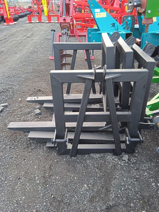 Podnośnik na tylni TUZ ciągnika rolniczego z widłami 100cm paleciak