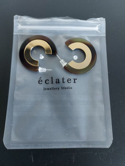 Brincos éclater nunca usados