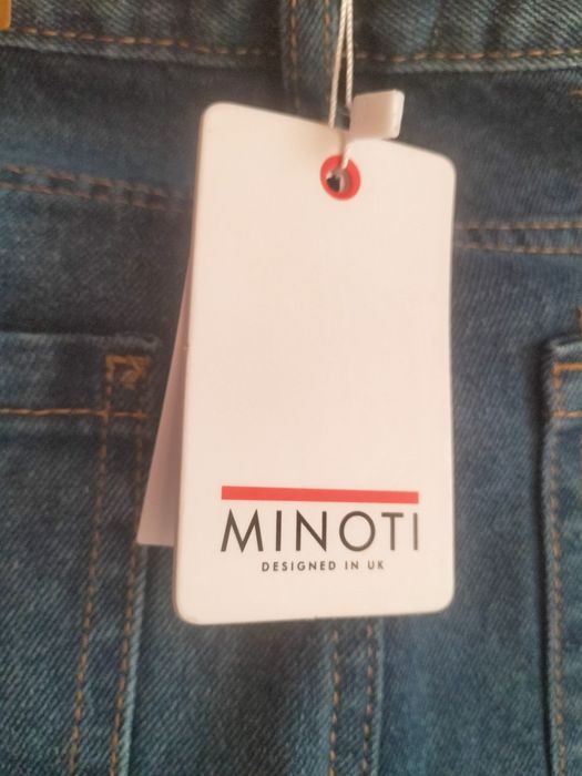 Nowe spodnie jeansowe 140/146