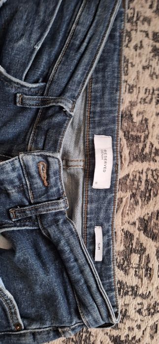 Jeansy slim z efektem sprawia 31/32