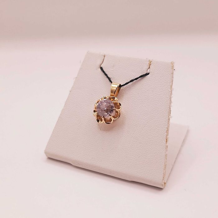 Złota zawieszka pr. 585 - Kwiatek z cyrkonią 2,25g.