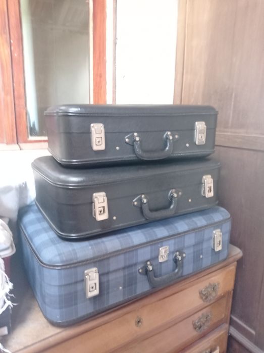 Três malas antigas