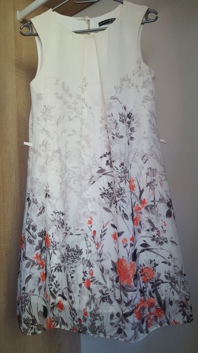 Sukienka ma lato Atmosphere kremowa w kwiaty r.36/S