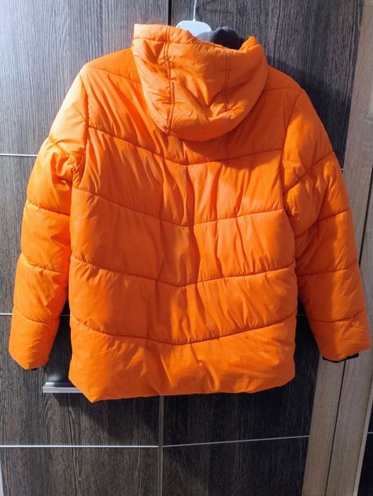 Zimowa kurtka chłopięca r.158 Reserved pomaranczowa