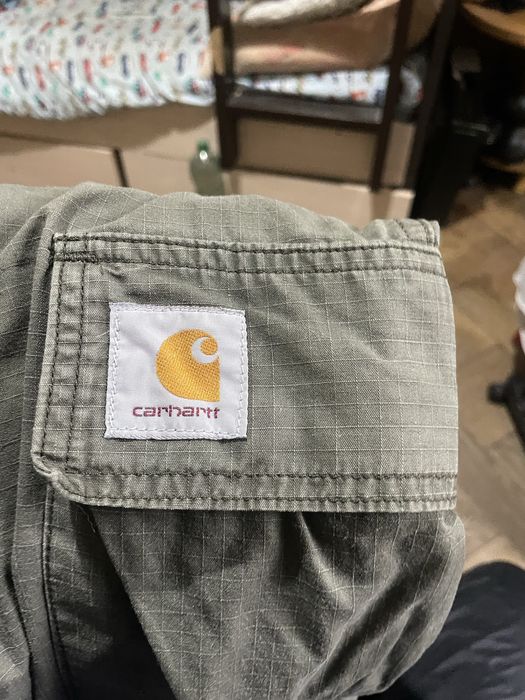 Джинси кархарт з дефектами