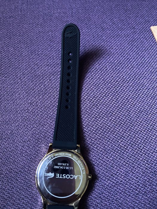 Zegarek Lacoste w kolorze złotym i czarnym paskiem