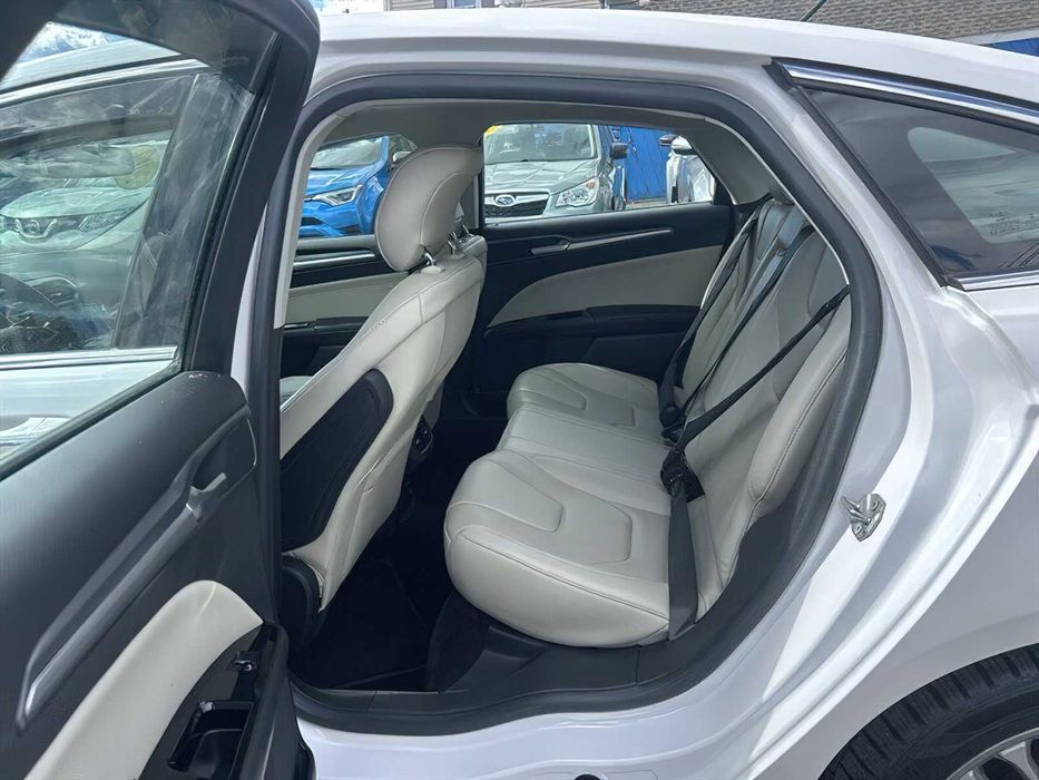 Ford Fusion Titanium Hybrid      2014
