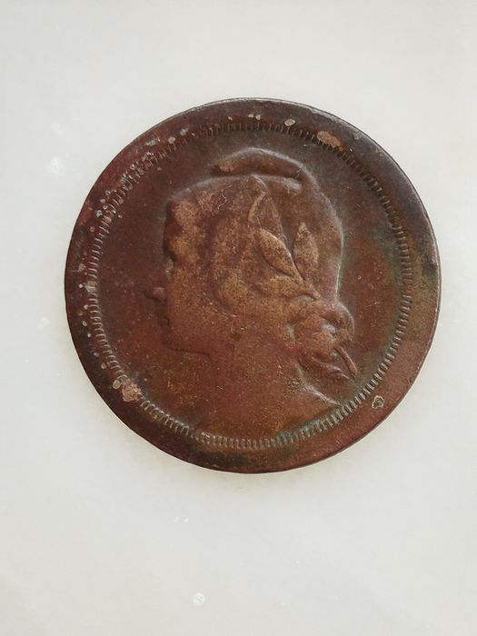 Moeda antiga de 20 centavos da república portuguesa do ano 1924.