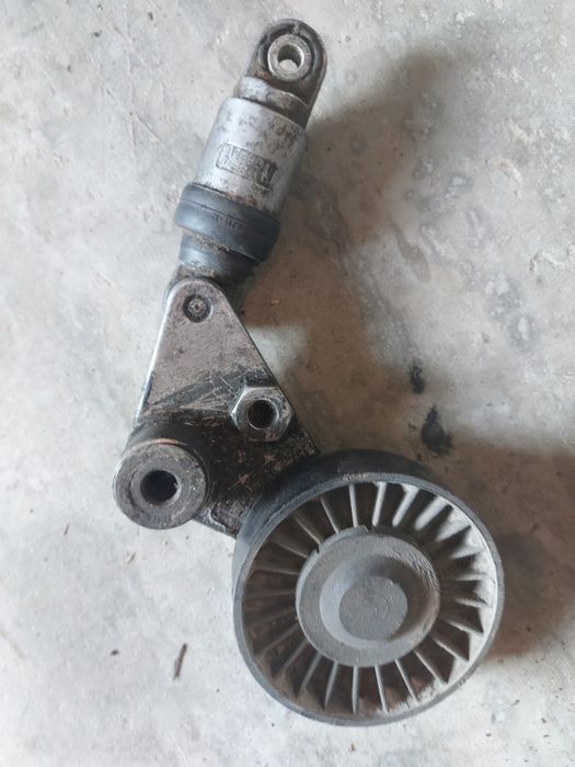 Натяжний механізм з роликом ремня генератора ОПЕЛЬ 2.0, 2.2 dti