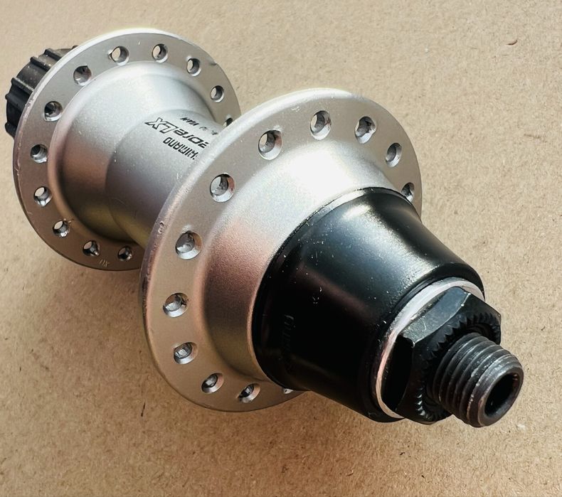 Piasta Tylna SHIMANO DEORE LX FH-M580 32 Szprychy Kaseta 8/9/10s 9x135