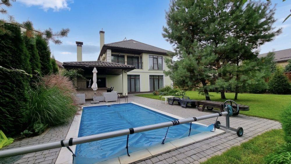 Оренда будинку під Києвом 227м² біля річки: басейн, сауна, генератор, сосновий ліс, закрита територія район Новосілки