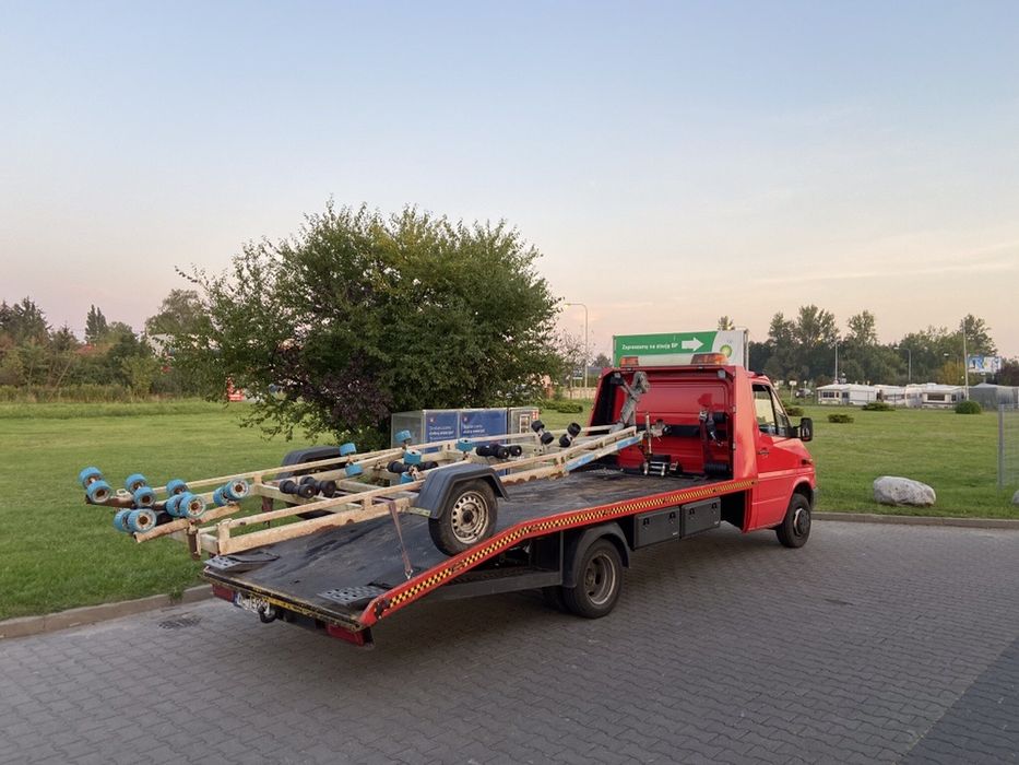 POMOC DROGOWA  laweta holownik mokotow ursynow odpalanie przewozy A2