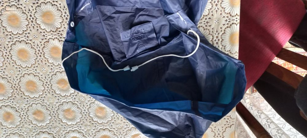 Пончо  дощовик . Матеріал PVC .