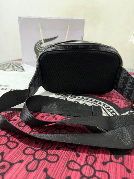 Bolaa da lacoste da cintura