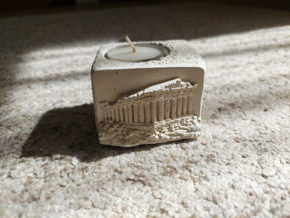 Vela com base em pedra