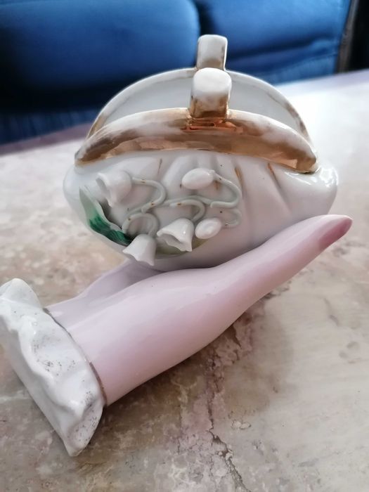 Biblô antigo mão com bolsa