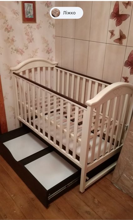 Дитяче ліжечко 120х60 з маятником та шухлядою (слонова кістка/горіх)