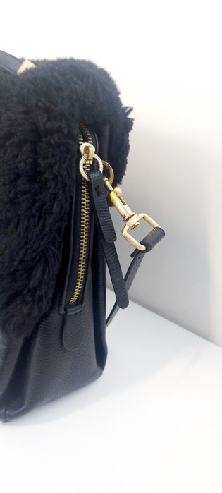 Mala mão ou tiracolo