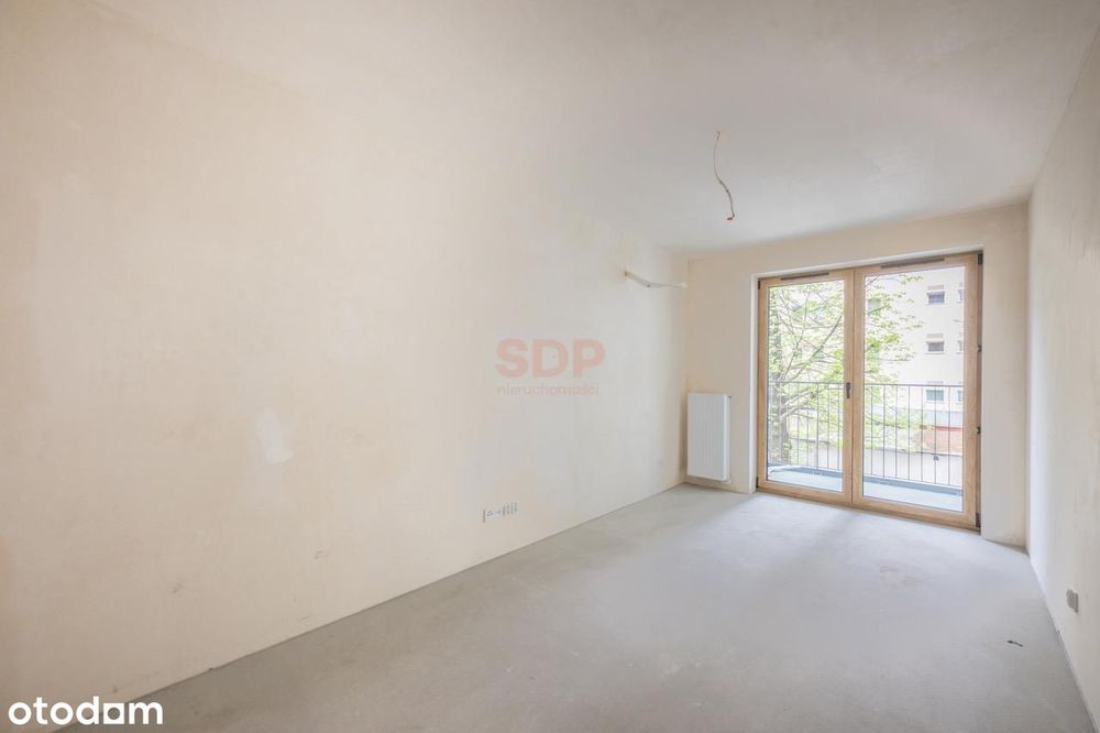 2-pokojowy apartament w sąsiedztwie odrestaurowanych kamienic.