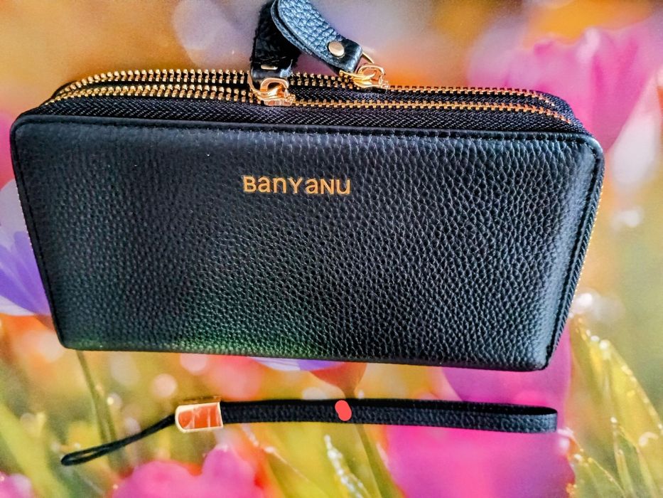 Portfel torebka na nadgarstek saszetka ze skóry naturalnej ,nowa