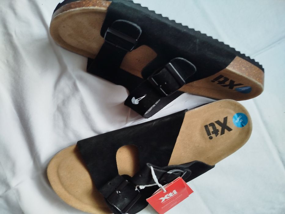 Продам новые мужские шлепанцы черного цвета натур.замш45размер