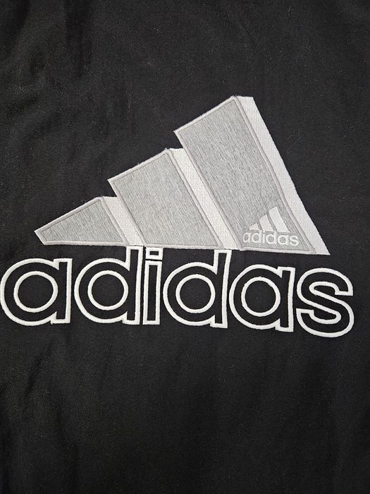 Kurtka wiatrówka adidas z wyszywanym logo od tyłu